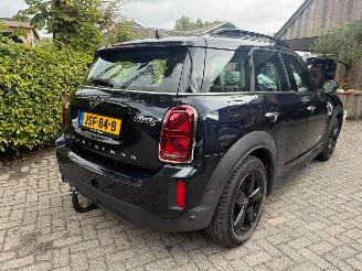skadebil auto Mini Countryman COOPER SE ALL4 LEER PANO 2023/1