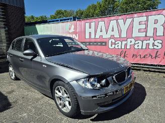 Schadeauto BMW 1-serie 118I  business line 2009/9