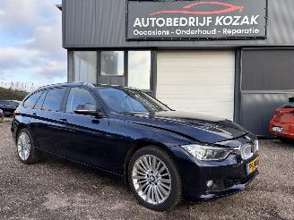 skadebil auto BMW 3-serie 320i xDrive High Executive 4x4 automaat 2013/8