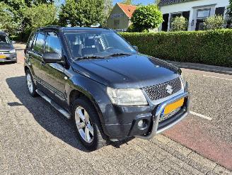 damaged passenger cars Suzuki Grand-vitara 2.0 16V 2006/11