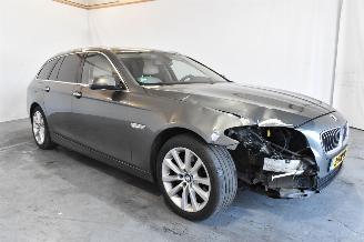 Damaged car BMW 5-serie 525d Luxury Edition 2014/3