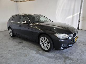 skadebil auto BMW 3-serie Touring 320i High Executive 2013/1