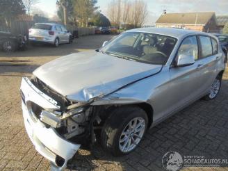 damaged passenger cars BMW 1-serie 114d 2014/9