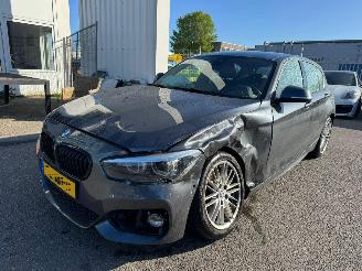 damaged passenger cars BMW 1-serie 120i Executive 2018/10