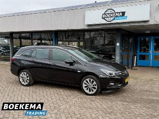 Schadeauto Opel Astra Sports Tourer 1.0 Edition Automaat Navigatie Clima Cruise PDC 2016/7