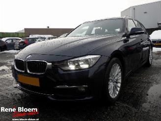 Schadeauto BMW 3-serie 318i High Executive Touring Navi 2017/6