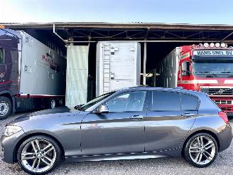 skadebil auto BMW 1-serie 120i 177pk 8-traps aut M-Sport - schuifdak - navi - pdc - keyless - alcantara - zwarte hemel - stoelverw 2015/7