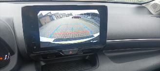 Toyota Yaris Bj:11-2024 Facelift hybrid Digitaal Cockpit full-Led Climatecontrol CruiseControl Stoelverwarming Lichtautomaat Privacyglas Apple CarPlay MirrorLink Achteruitrijcamera Bi-Color pearl metallic picture 25