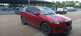 Vaurioauto  passenger cars Mazda CX-5 2.2D 175pk Automatik 4x4 Schuifdak Navi Bose Leder memory Xenon Led Motorschade 2014/11