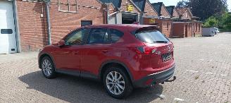 Mazda CX-5 2.2 175pk Automatik 4x4 Navigatie Xenon Climatecontrol CruiseControl Stoelverwarming Lichtautomaat Privacyglas Regensensor Achteruitrijcamera Keyless entry picture 2