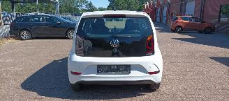 Volkswagen Up! Move Up! 1.0 65pk Airconditioning Led verlichting Parkeersensoren achter Achteruitrijcamera Elektrische ramen Dab Radio cruisecontrol Boordcomputer Navigatie/Telefoon houder picture 11