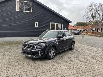 Damaged car Mini Countryman HYBRIDE PLUG IN SE 4AWD AUTOMAAT NAVI CLIMA LEER LED PDC B.J 2019 2019/2