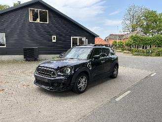 damaged passenger cars Mini Countryman COOPER HYBRIDE PLUG IN SE 4AWD AUTOMAAT NAVI CLIMA LEER LED PDC B.J 12-2019 2019/12