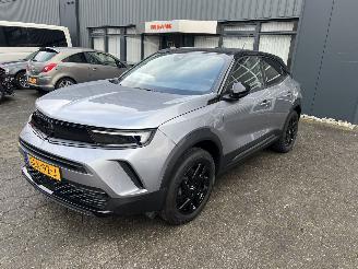 damaged passenger cars Opel Mokka 1.2 Turbo Hybrid GS 2024/9